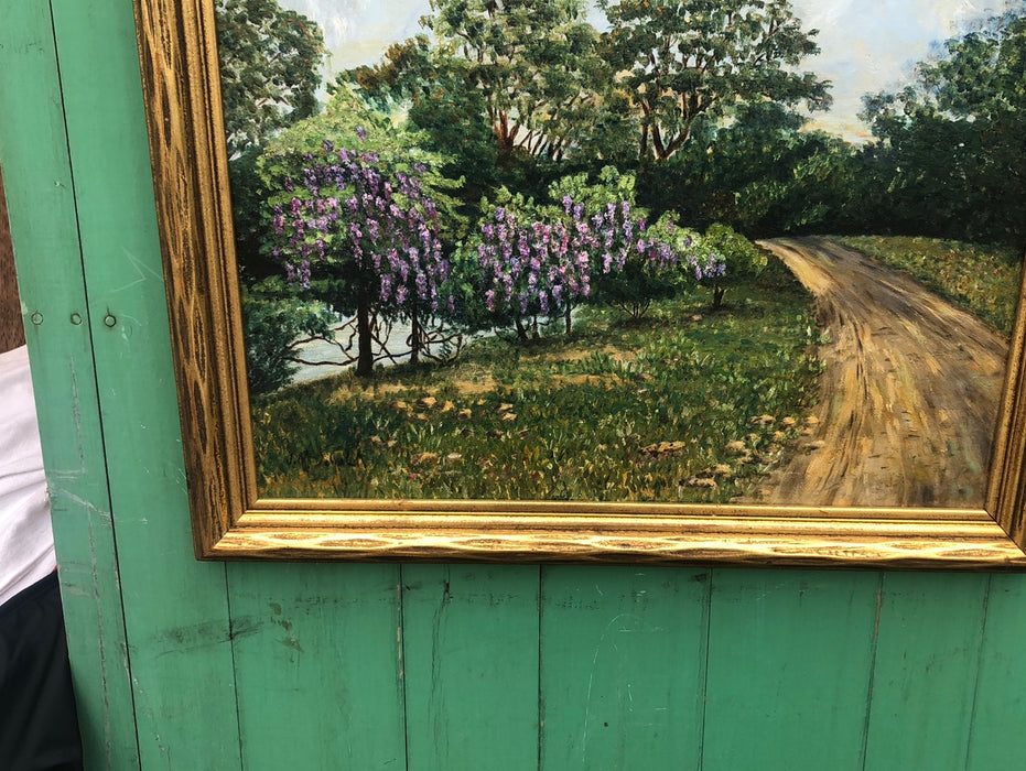 OIL PAINTING OF A COUNTRY ROAD WITH PURPLE FLOWERING TREES