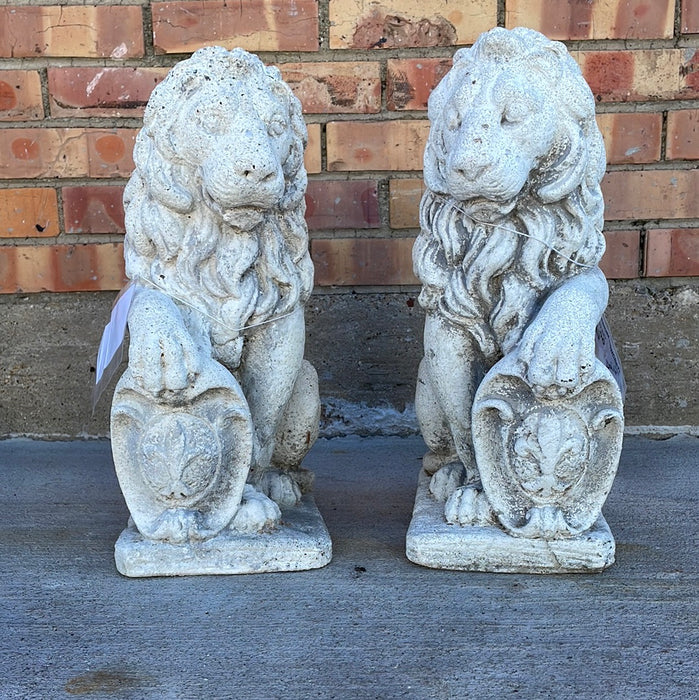 PAIR OF SMALL CONCRETE LIONS