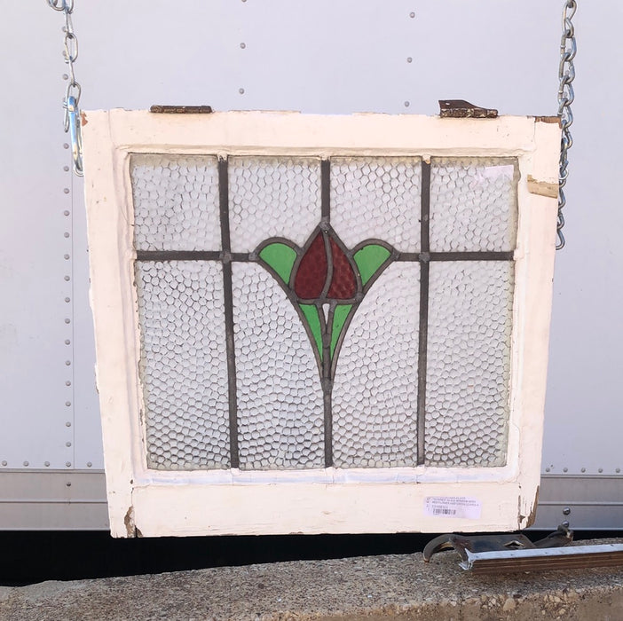 STAINED GLASS WINDOW WITH RED FLOWER AND GREEN LEAVES