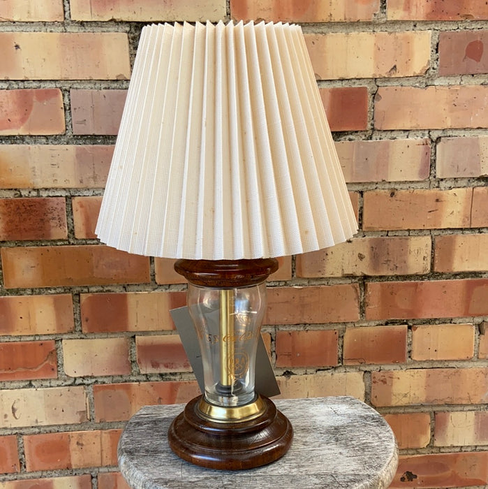 1976 OLYMPICS COCA COLA GLASS LAMP ON WOOD STAND