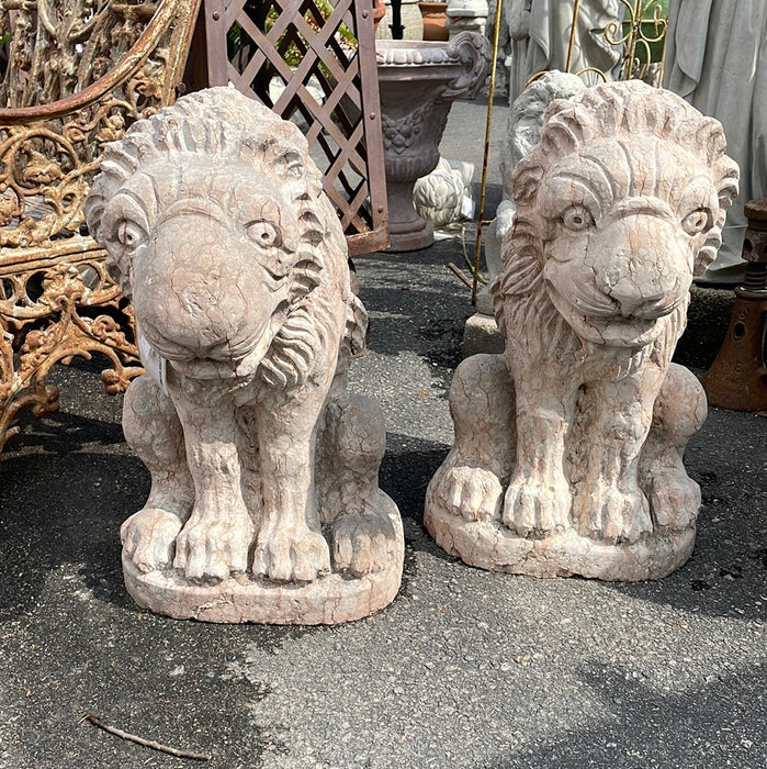 PAIR OF PALE PINK MARBLE GARGOYLES