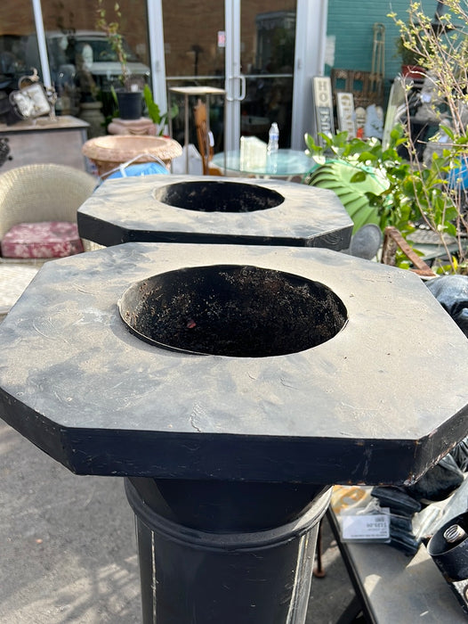 PAIR OF BLACK METAL COLUMNS WITH PLANTER TOPS