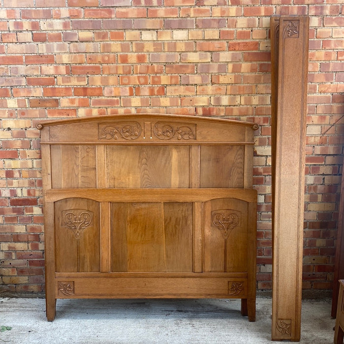 OAK BED WITH CARVED VINES