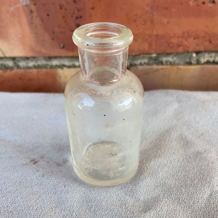 SMALL CLEAR GLASS DRUG BOTTLE