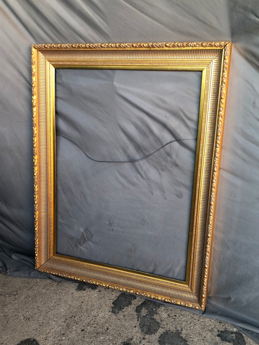 TALL CONCAVE FLUTED GOLD FRAME WITH RELIEF