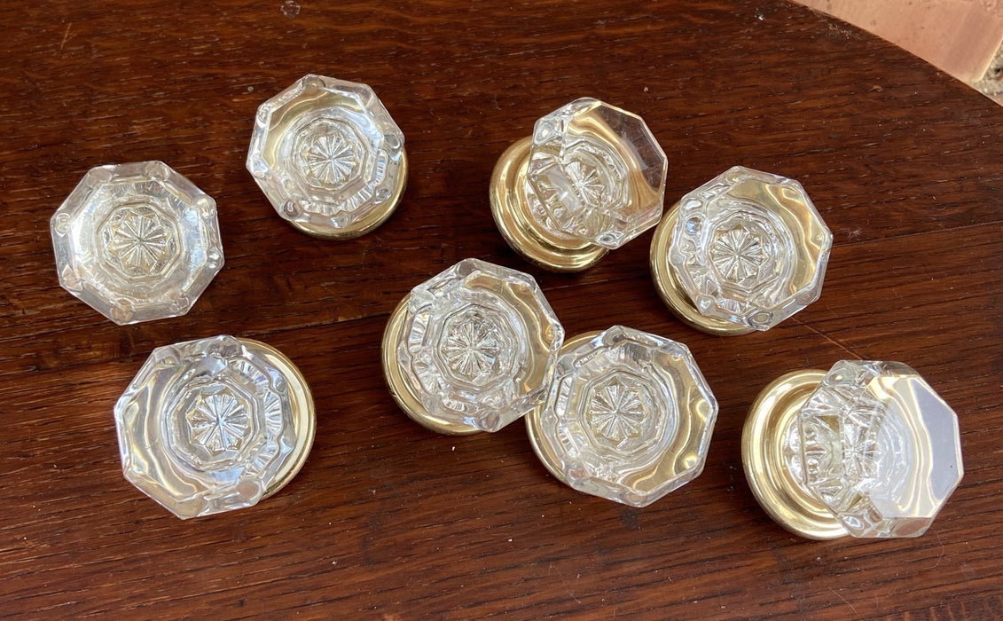 SET OF 8 CLEAR GLASS AND BRASS DOOR KNOBS
