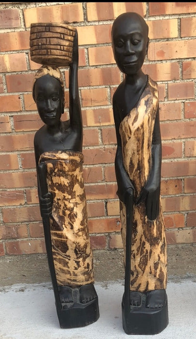 PAIR OF CARVED WOOD AFRICAN MAN AND WOMAN STATUES