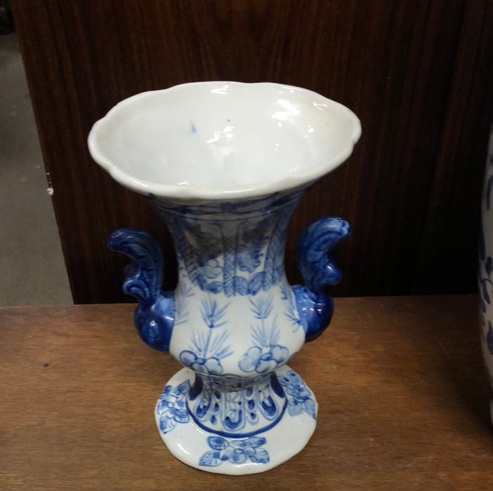 SMALL BLUE AND WHITE FOOTED VASE
