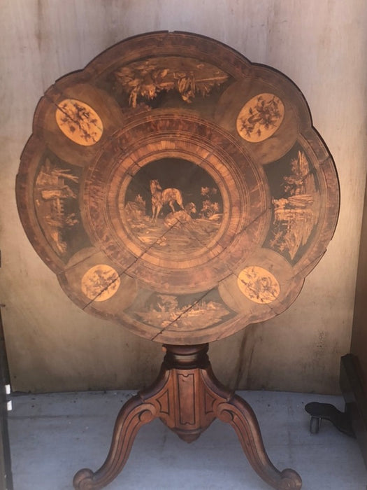 TILT TOP PEDESTAL TABLE WITH INLAID DOGS AND FIGURES-AS FOUND