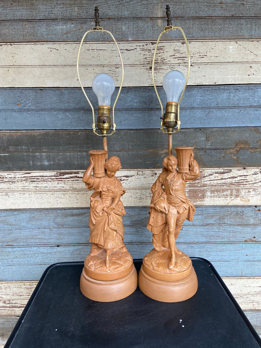PAIR OF TAN COMPOSITE MAN AND WOMAN LAMPS