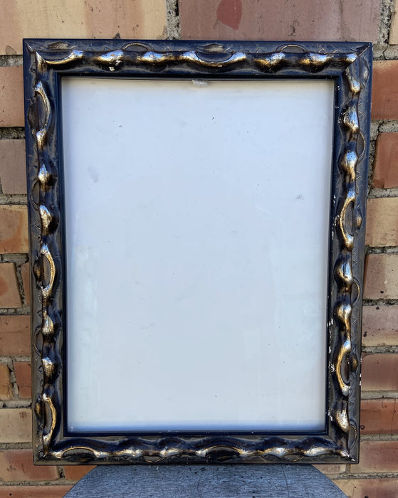 SMALL ORNATE SILVER FRAME WITH HEAVY RELIEF
