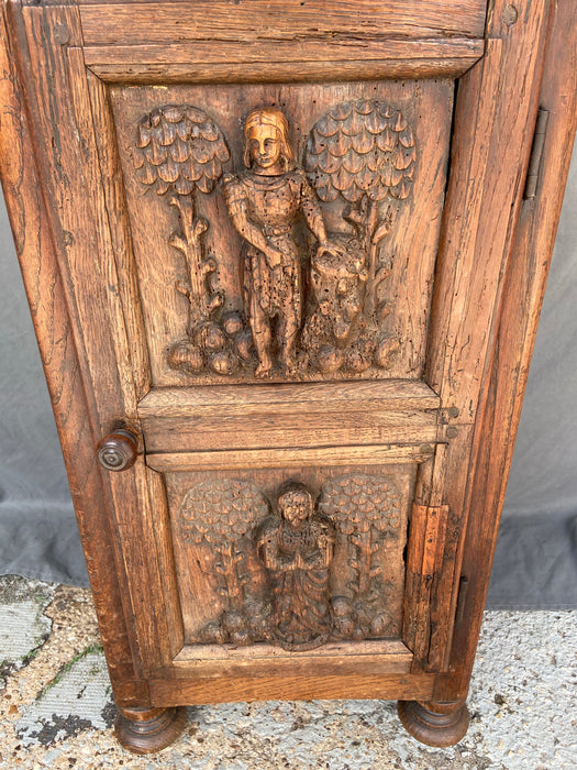 EARLY FIGURAL CARVED OAK SIDE CABINET