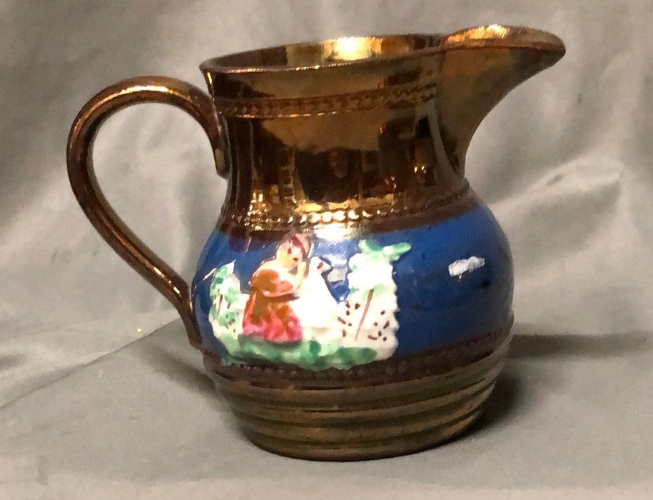 SMALL COPPER LUSTER PITCHER WITH WOMAN AND DUCK