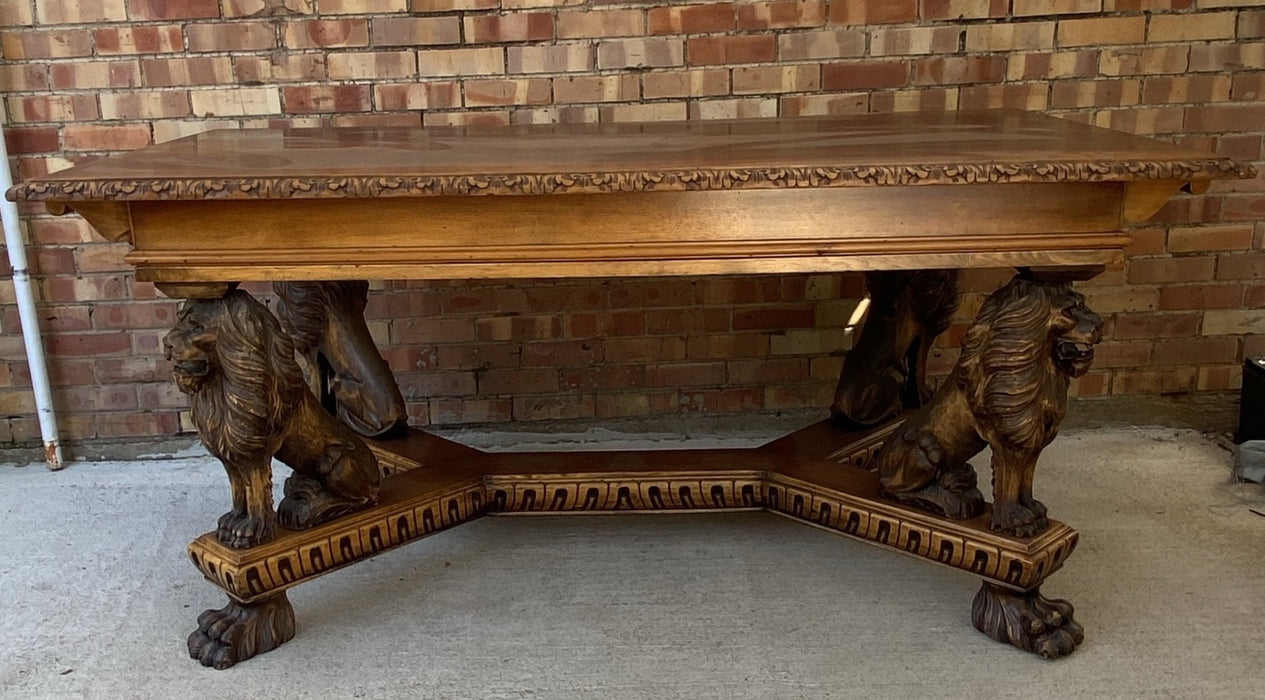 ITALIAN WALNUT DINING TABLE WITH CARVED LEGS