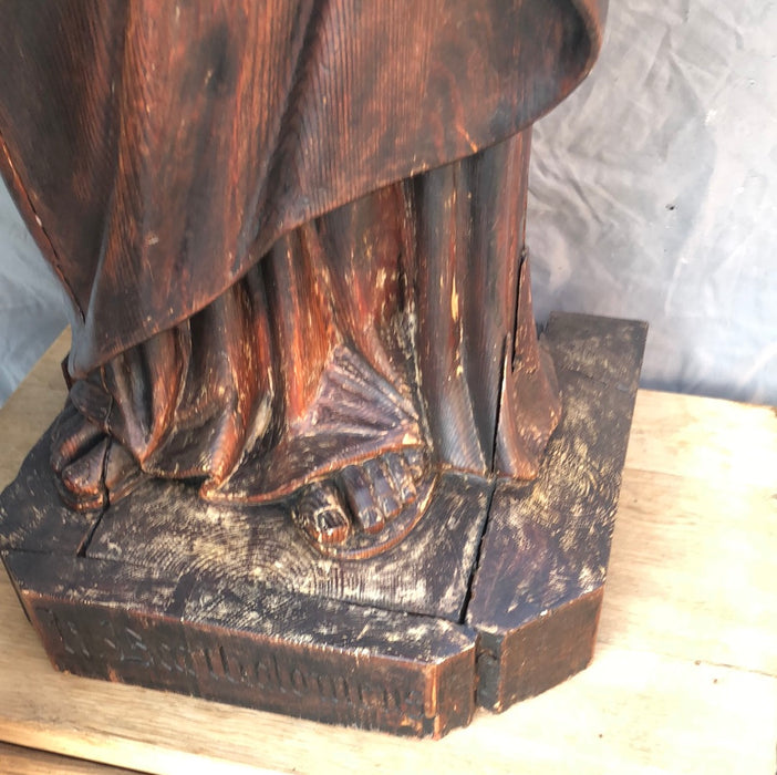 CARVED WOOD SAINT WITH CROSS