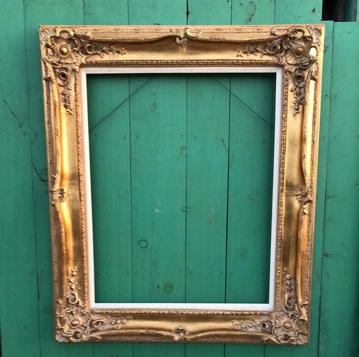 ORNATE GILT COMPOSITION FRAME