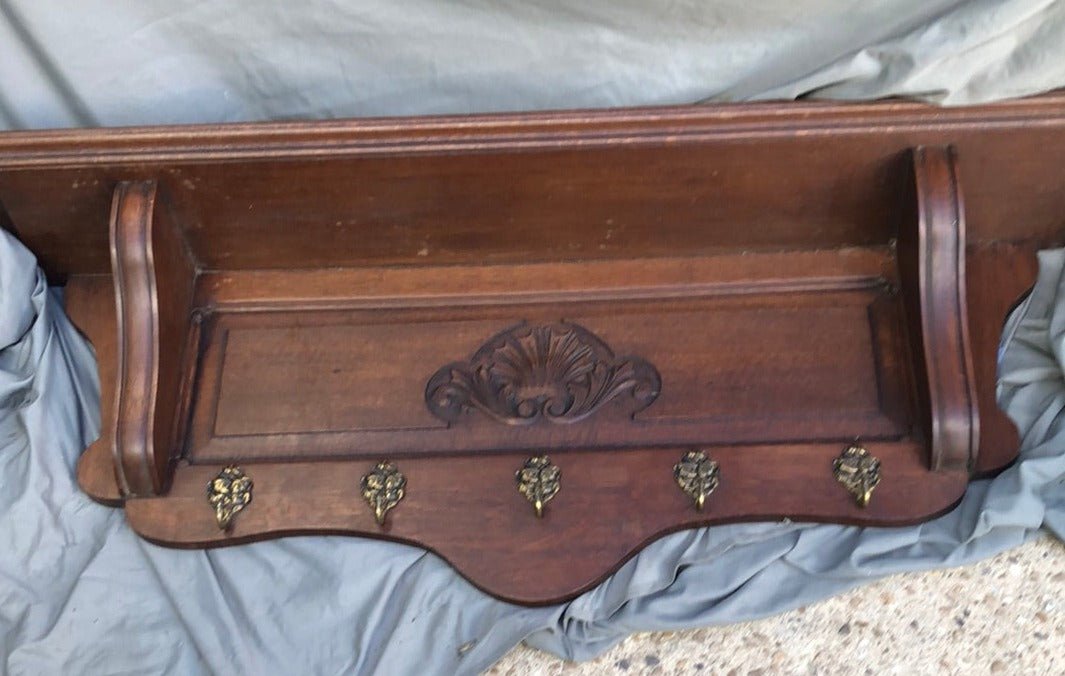 DARK OAK WALL SHELF WITH CENTER CARVED SHELL