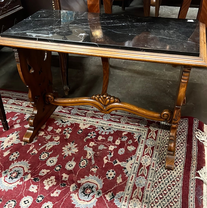 BLACK MARBLE TOP FACE CARVED WALNUT TRESTLE COFFEE TABLE