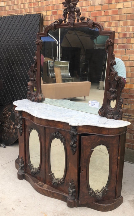 CURVED FRONT BURLED WALNUT SERVER WITH MIRRORED DOORS, CARVED MIRROR AND AS FOUND MARBLE TOP