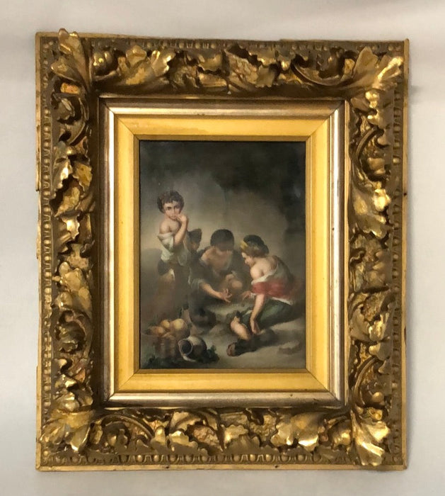 GOLD FRAMED PORCELAIN PLAQUE WITH 3 CHILDREN