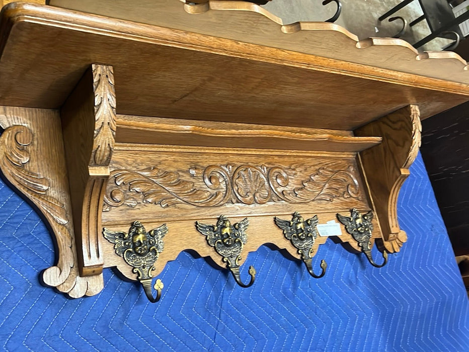 SMALL SHELL CARVING OAK WALL SHELF WITH CHERUB HOOKS