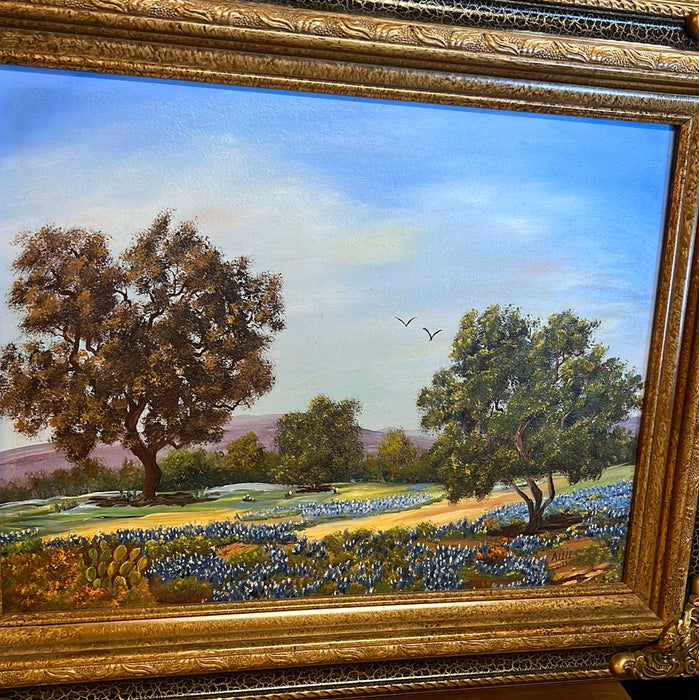 FRAMED OIL PAINTING WITH TREES AND BLUE BONNETS SIGNED ALLIE