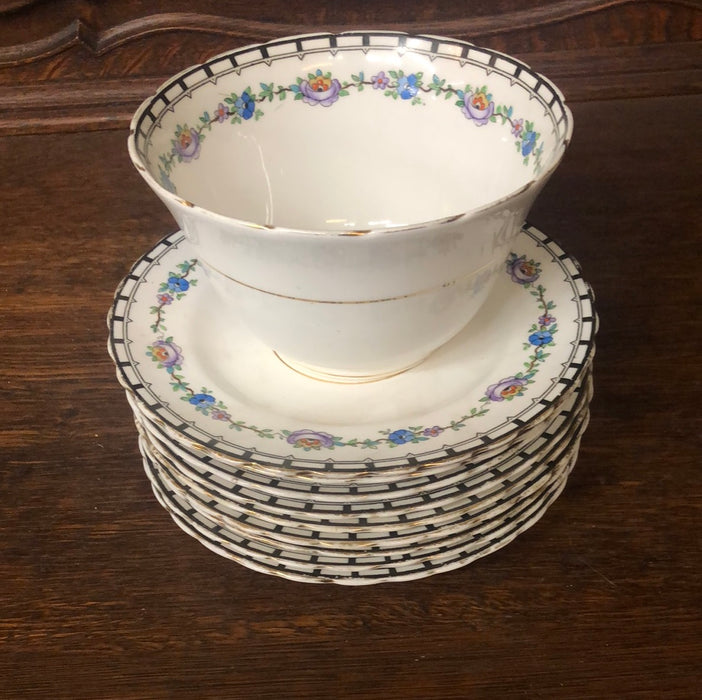 9 CHINA PLATES AND A SMALL BOWL BY TUSCAN