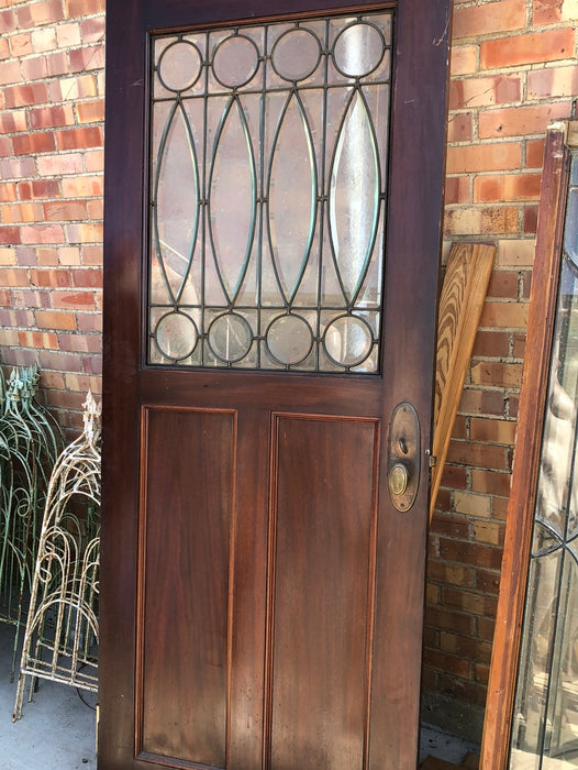 MAHOGANY TURN OF THE CENTURY DOOR WITH LEADED AND BEVELED GLASS