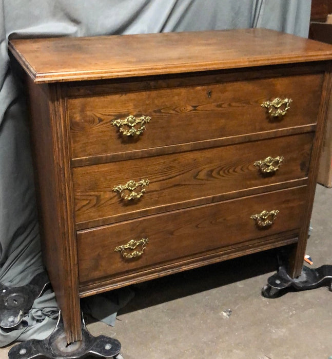 LATE 19TH CENTURY 3 DRAWER ELM CHEST WITH ORNATE BRASS HANDLES