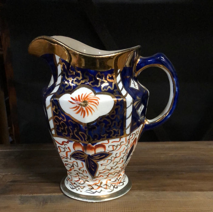 GAUDY WELCH ORANGE AND BLUE PITCHER