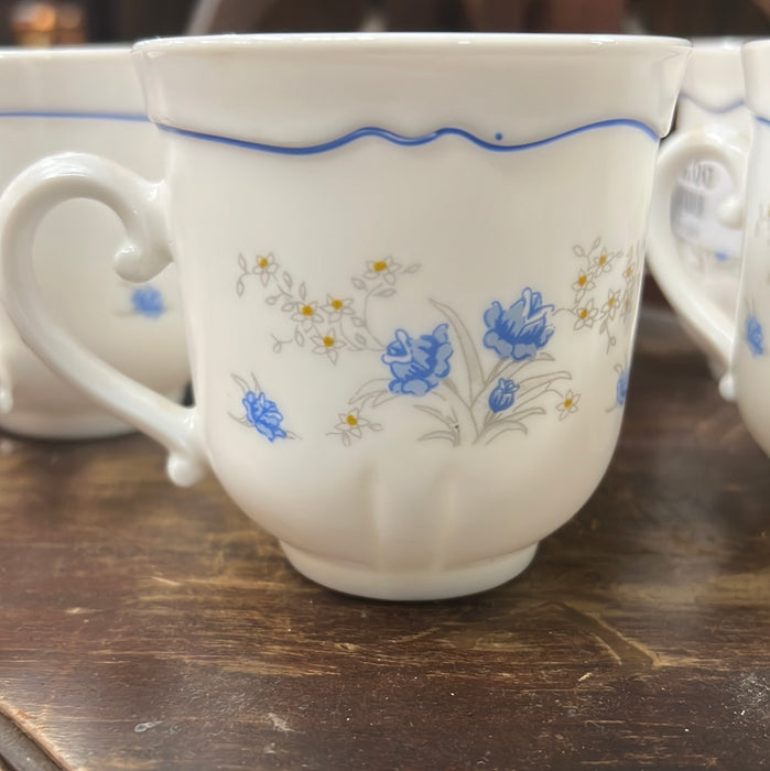 SET OF FIVE WHITE TEACUPS WITH BLUE FLOWERS