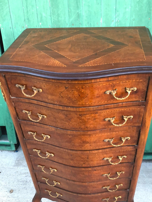 INLAID MAHOGANY BOW FRONT SEMAINIER WITH ORMOLU