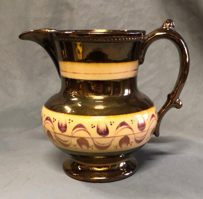 COPPER LUSTER PITCHER WITH 2 ORANGE BANDS AND TULIPS