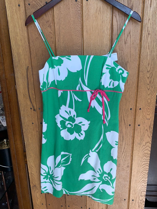 GREEN HIBISCUS PRINT DRESS WITH PINK RIBBON