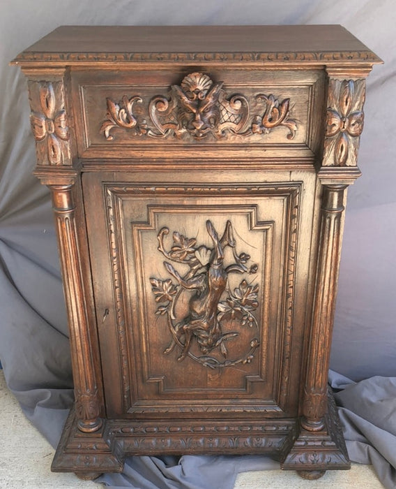 TALL OAK JAM CUPBOARD WITH RABBIT AND LION