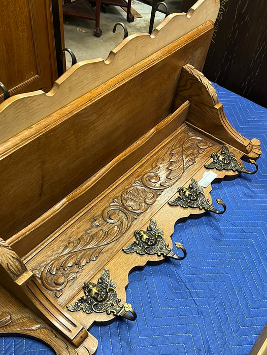 SMALL SHELL CARVING OAK WALL SHELF WITH CHERUB HOOKS