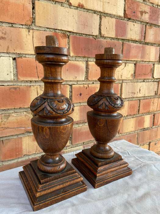 PAIR OF SHORT CARVED OAK POSTS