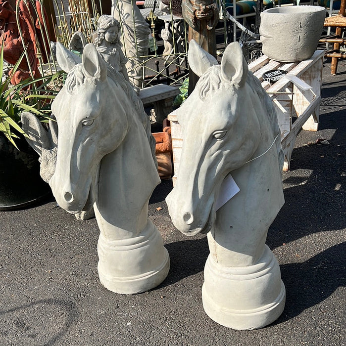 PAIR OF CONCRETE HORSE HEADS