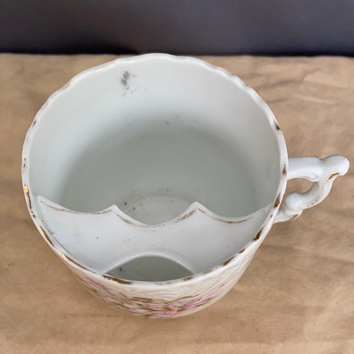 PORCELAIN FLORAL PAINTED MUSTACHE CUP CIRCA 1910