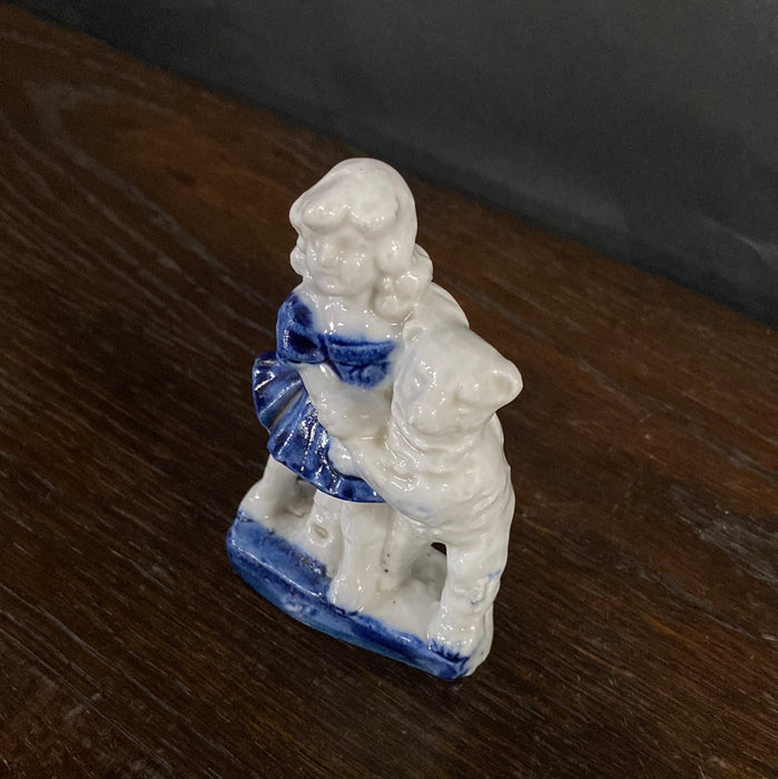 DELFT FIGURINE OF GIRL AND DOG