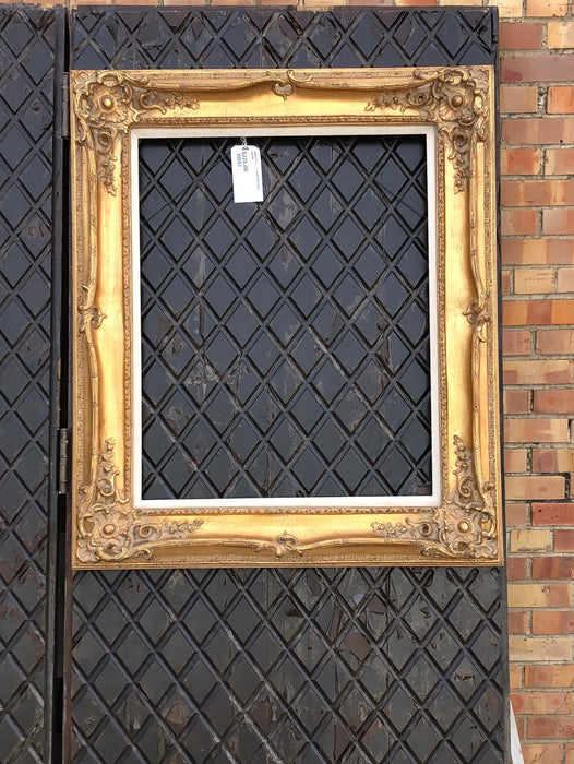 ORNATE GILT COMPOSITION FRAME