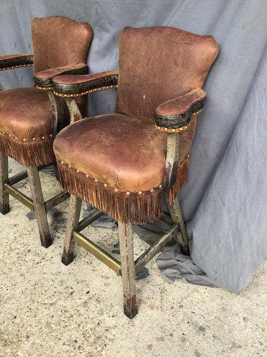 PAIR OF RUSTIC BARSTOOLS WITH LEATHER SWIVEL SEATS