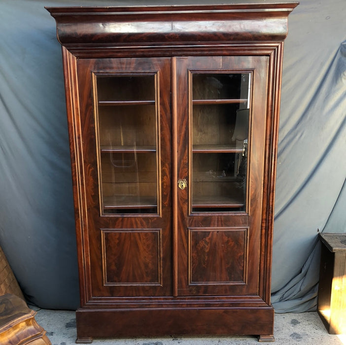 LOUIS PHILIPPEFIGURED MAHOGANY BOOKCASE AS FOUND