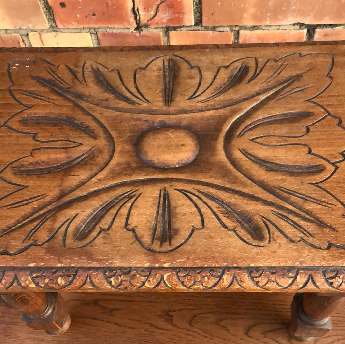 SMALL OAK BLOCK AND TURNED STOOL WITH FLORETTE CARVED TOP