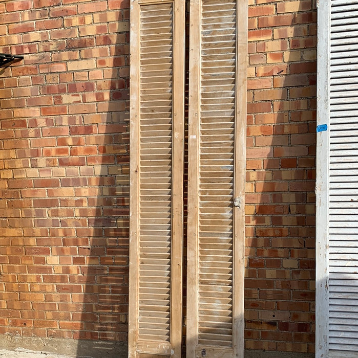 PAIR OF TALL RAW SHUTTERS