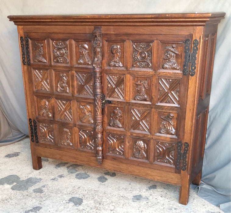 2 DOOR SHALLOW CARVED OAK GOTHIC CABINET with portraits