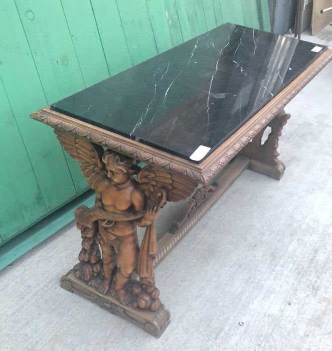 LARGE CARVED ANGEL TABLE WITH BLACK MARBLE TOP