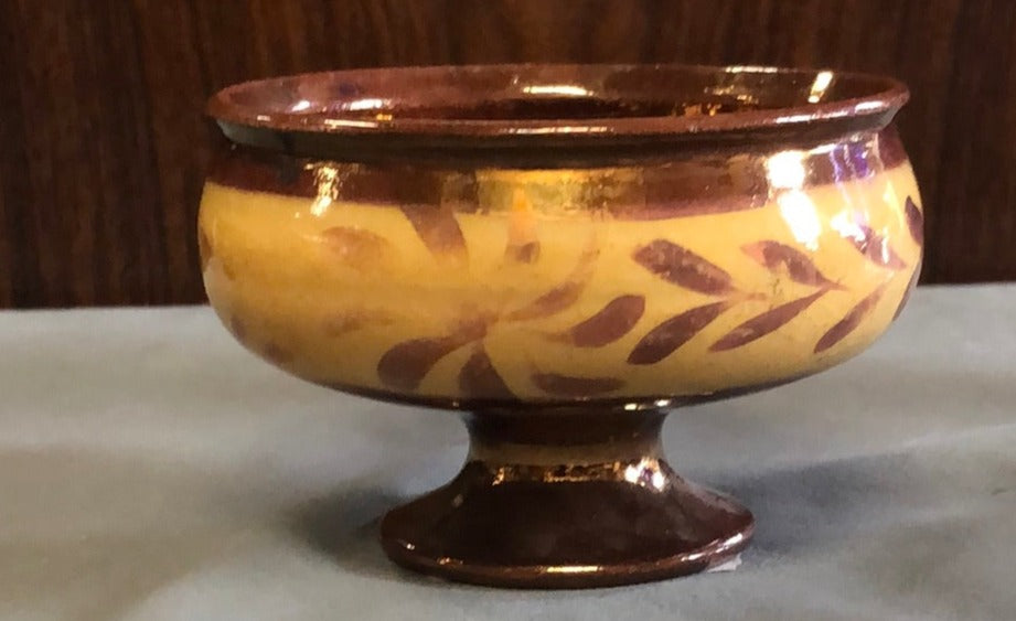 COPPER LUSTER FOOTED DISH WITH YELLOW BAND PINWHEEL