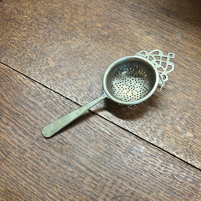 SILVERPLATE TEA STRAINER WITH HANDLE (AND HALLMARK)