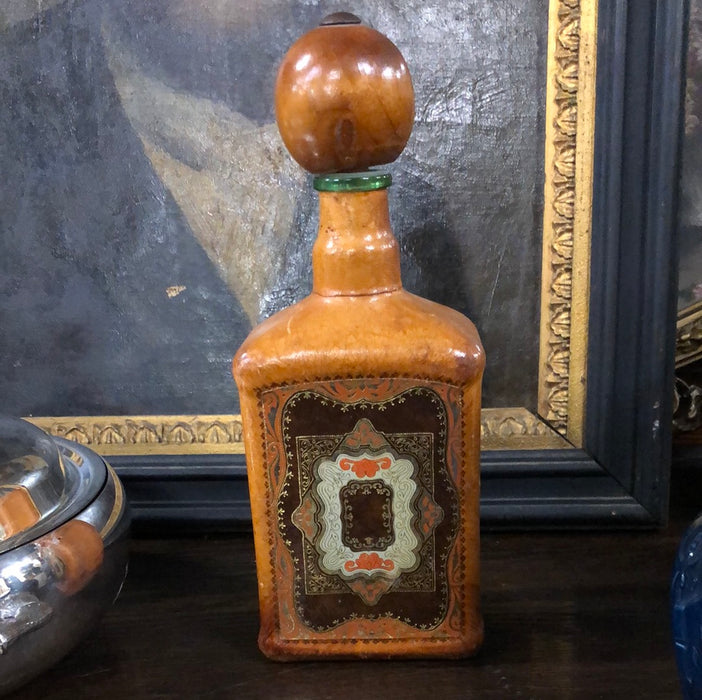 LEATHER CLAD LIQUOR BOTTLE